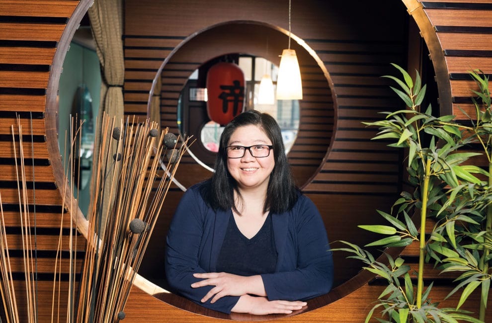 Mikado owner Connie Lee with her her arms crossed smiling.