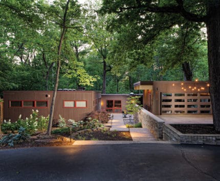 Exterior of midcentury modern home at dusk