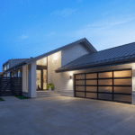 Exterior of contemporary lakehouse at sunset