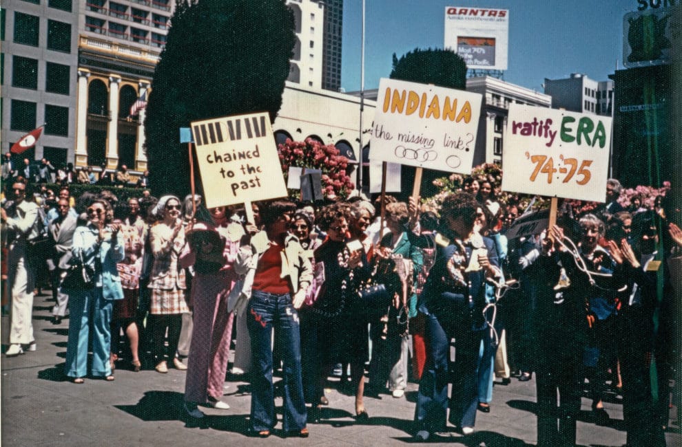 Women march in support of the ERA.