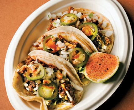 Three street tacos filled with the Filipino breakfast staple, spicy-sweet longanisa sausage.