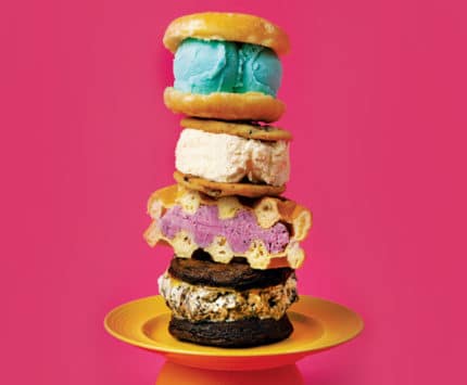 stack of ice cream sandwiches on pink background