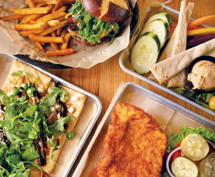 Several plates of food on a table