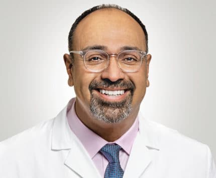 A smiling Dr. Atul Chugh, cardiologist, St. Franciscan Physician Network Indiana Heart Physicians