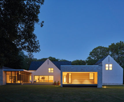 A white house at dusk