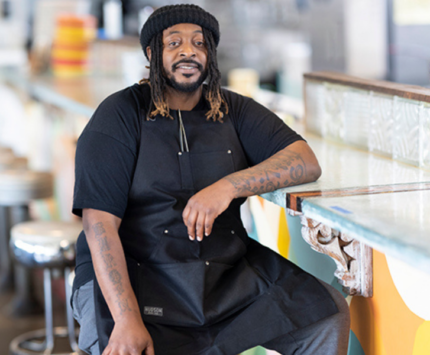 a man sitting at a counter