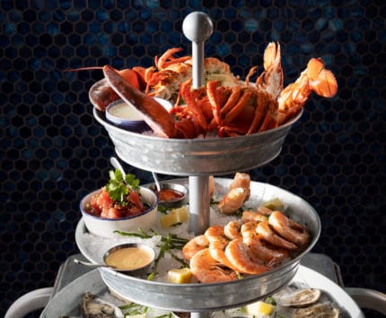 a seafood tower at Raw Bar by Slapfish