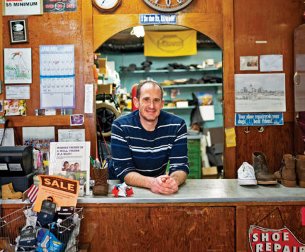 A man at a shoe and repair shop in Beech Grove