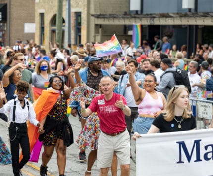 Mayor Joe Hogsett walks in the Indy Pride Parade