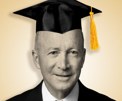 Mitch Daniels in a graduation cap