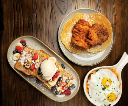 chicken and pancakes, egg hash, and french toast with fruit