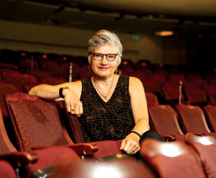 Janet Allen, artistic director of Indiana Repertory Theatre sitting