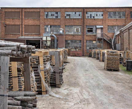 Outside the Old Hickory factory pallets of lumber