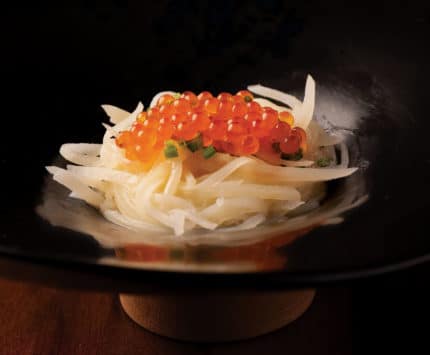 potato strings topped with fish roe