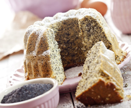a picture of a sliced poppyseed cake